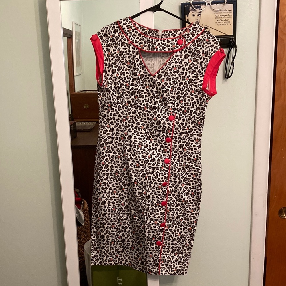 Brand new, with tags Voodoo Vixen floral/animal print leopard wiggle dress